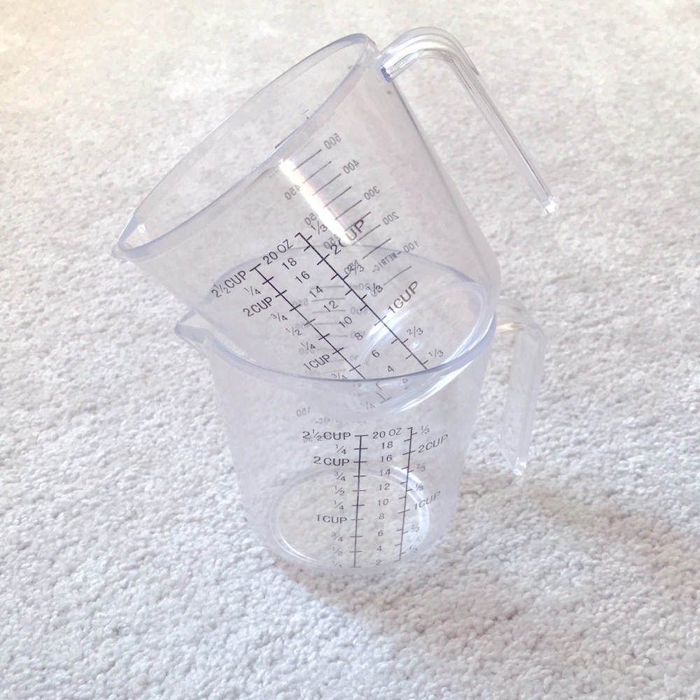 Two Plastic Measuring Cups